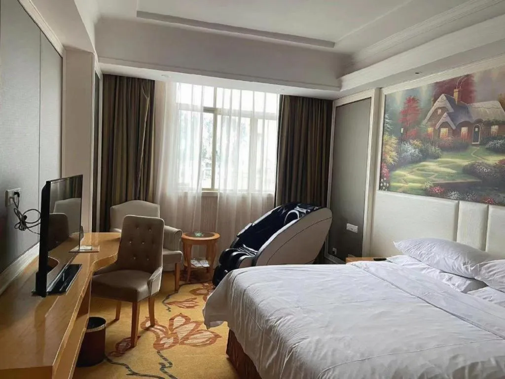 Bed in Vienna Hotel Guangdong Huiyang Qiuchang Yingbin Road