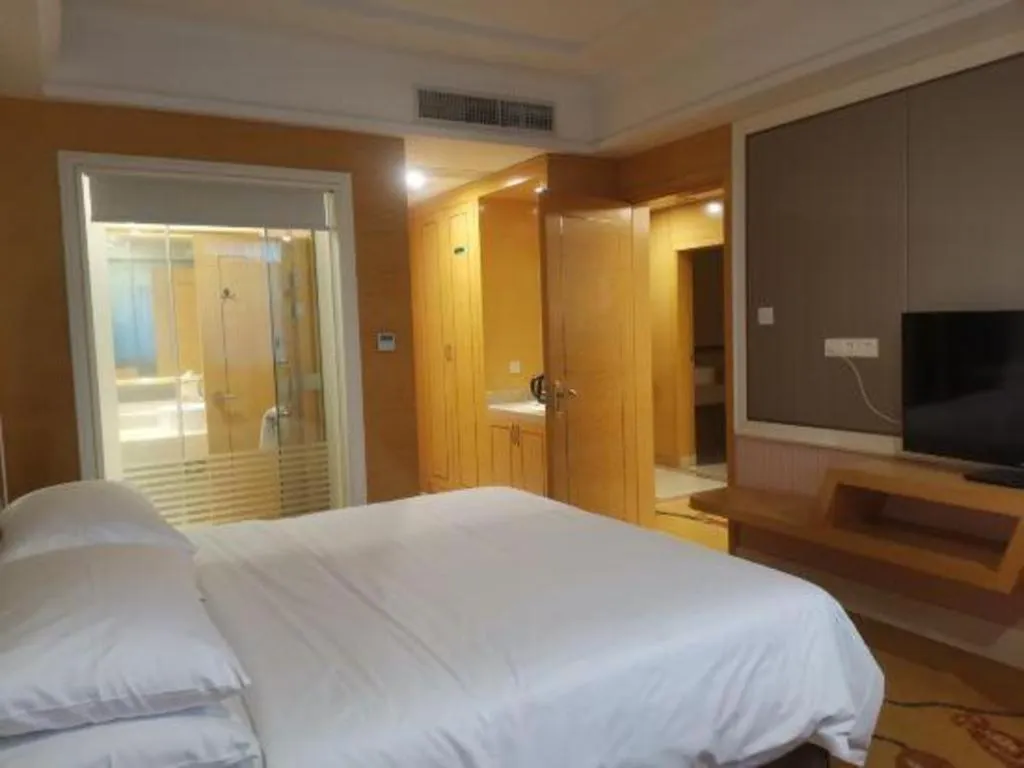 Bed in Vienna Hotel Guangdong Huiyang Qiuchang Yingbin Road