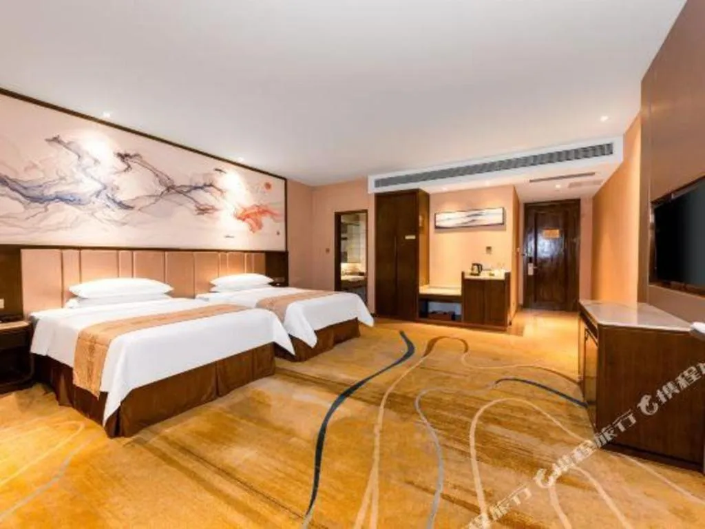 Bed in Venus Royal Hotel Nanning East High-Speed Railway Station