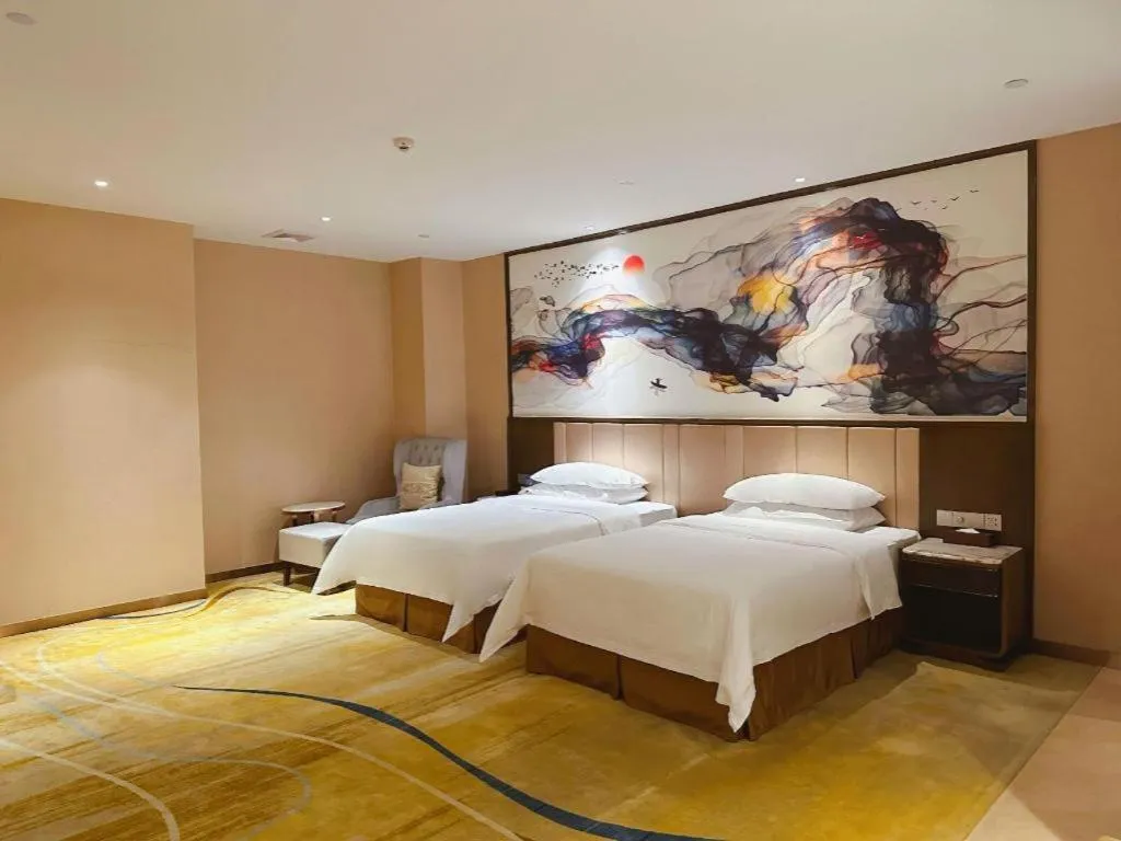 Bed in Venus Royal Hotel Nanning East High-Speed Railway Station