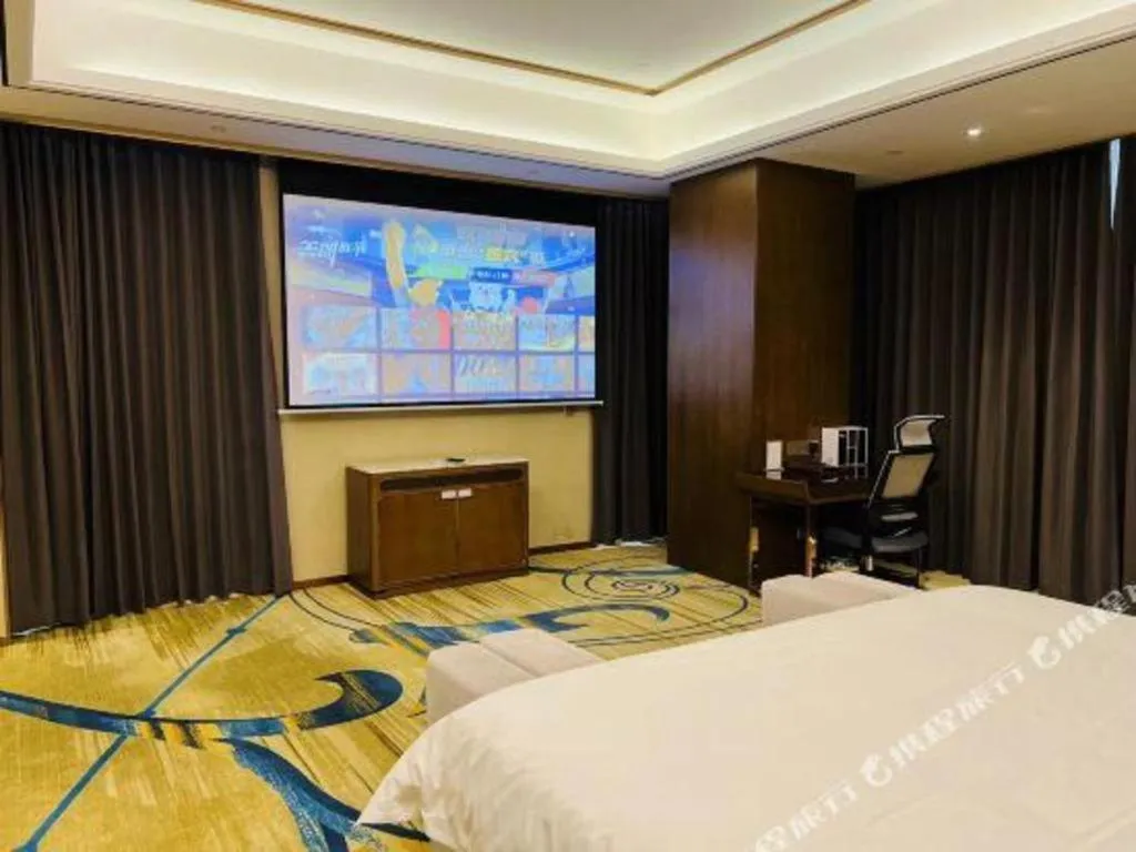 Bed in Venus Royal Hotel Nanning East High-Speed Railway Station