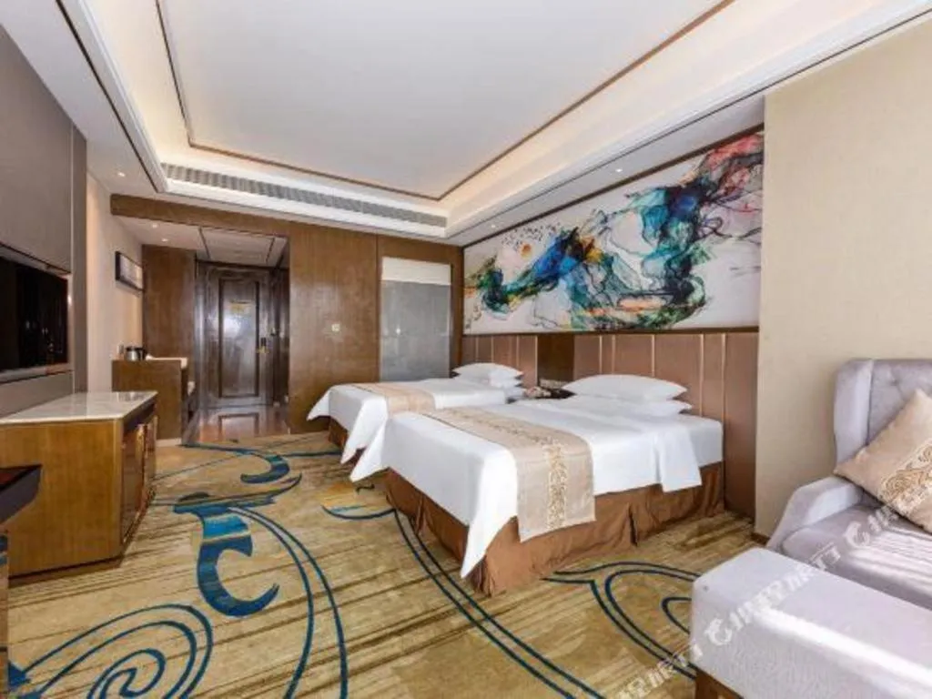 Bed in Venus Royal Hotel Nanning East High-Speed Railway Station