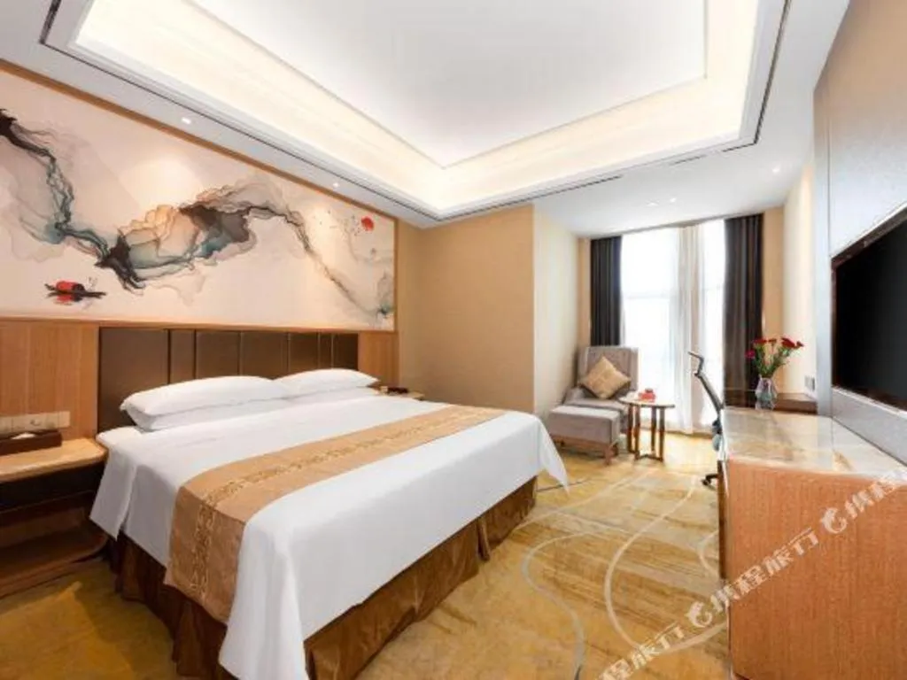 Bed in Venus Royal Hotel Nanning East High-Speed Railway Station