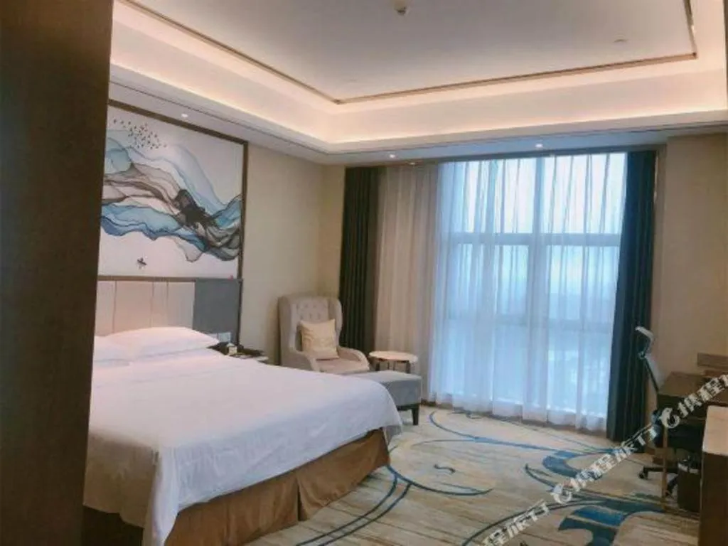 Bed in Venus Royal Hotel Nanning East High-Speed Railway Station