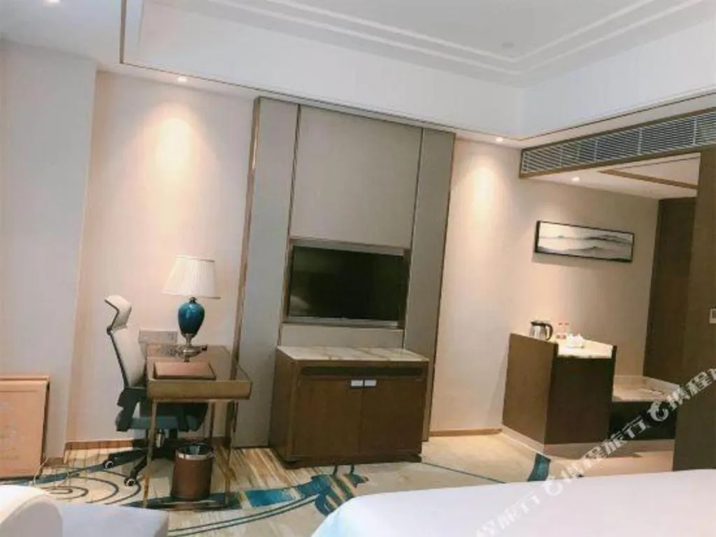 Bed in Venus Royal Hotel Nanning East High-Speed Railway Station