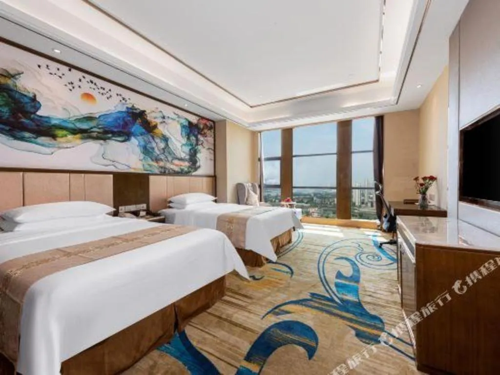 Bed in Venus Royal Hotel Nanning East High-Speed Railway Station