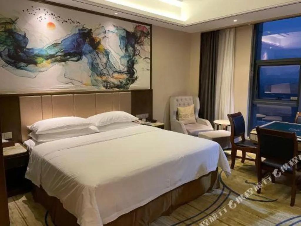 Bed in Venus Royal Hotel Nanning East High-Speed Railway Station