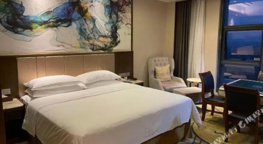 Bed in Venus Royal Hotel Nanning East High-Speed Railway Station