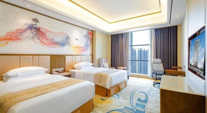 Bed in Venus Royal Hotel Nanning East High-Speed Railway Station