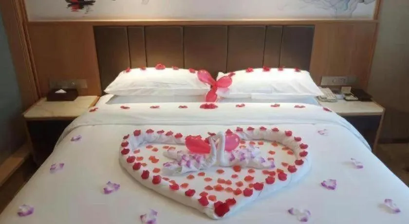 Bed in Venus Royal Hotel Nanning East High-Speed Railway Station