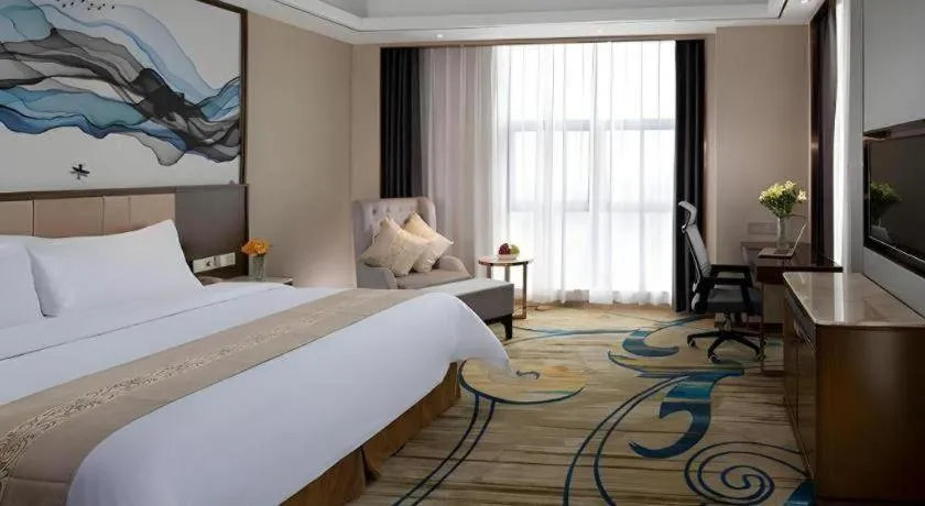 Bed in Venus Royal Hotel Nanning East High-Speed Railway Station