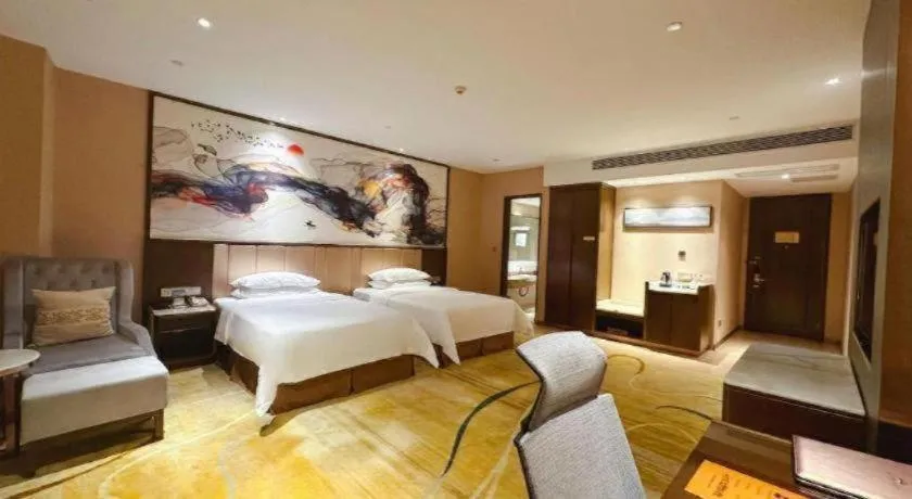 Bed in Venus Royal Hotel Nanning East High-Speed Railway Station