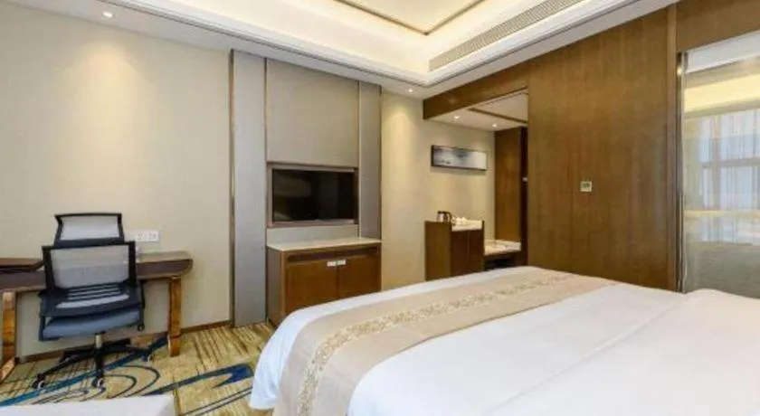 Bed in Venus Royal Hotel Nanning East High-Speed Railway Station