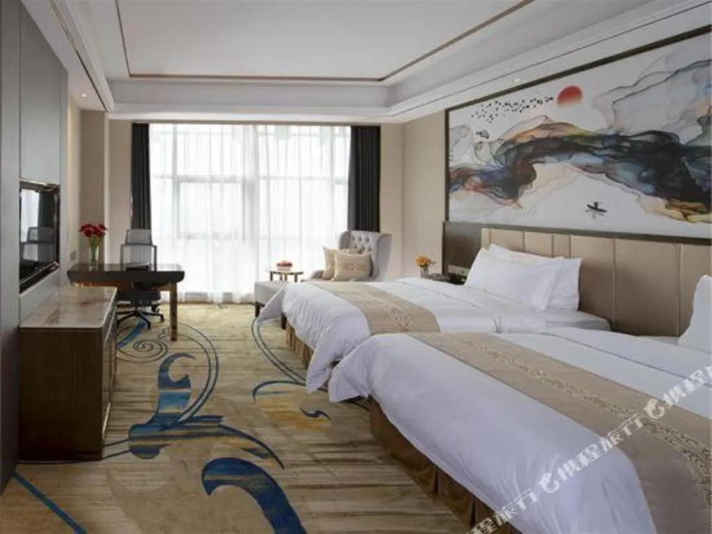 Bed in Venus Royal Hotel Nanning East High-Speed Railway Station