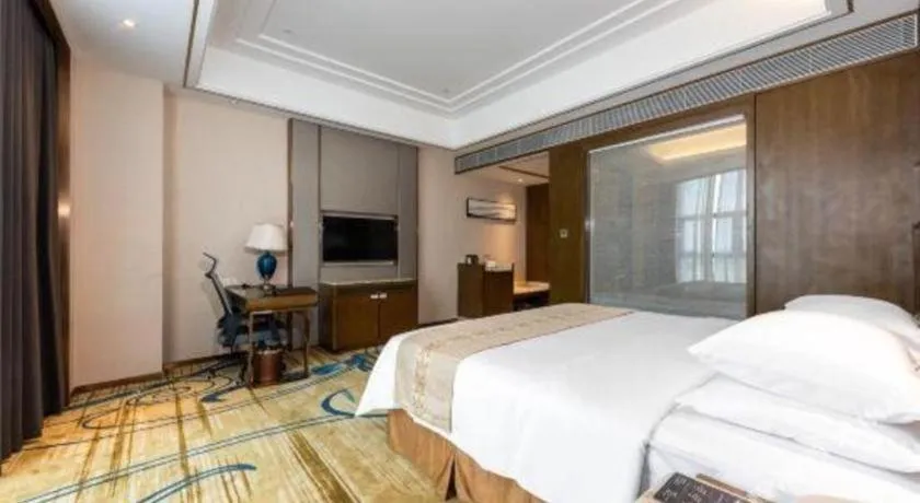 Bed in Venus Royal Hotel Nanning East High-Speed Railway Station