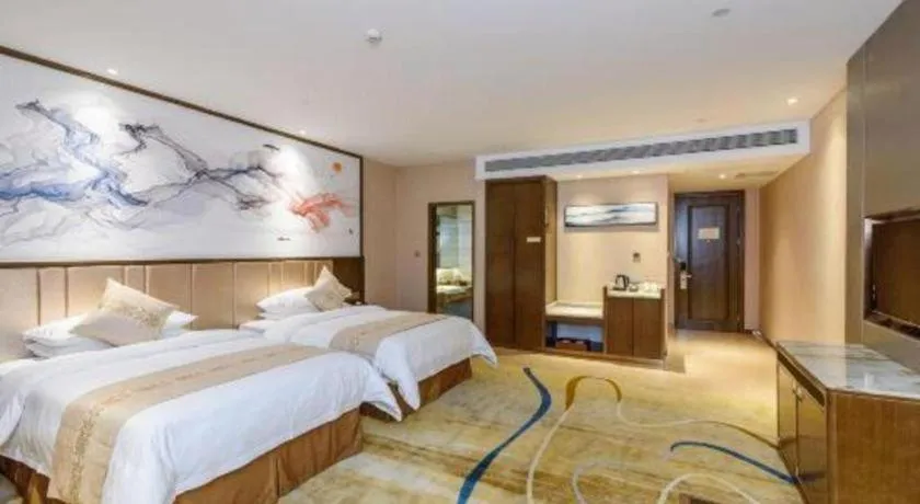 Bed in Venus Royal Hotel Nanning East High-Speed Railway Station