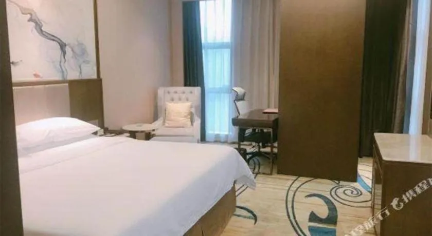 Bed in Venus Royal Hotel Nanning East High-Speed Railway Station