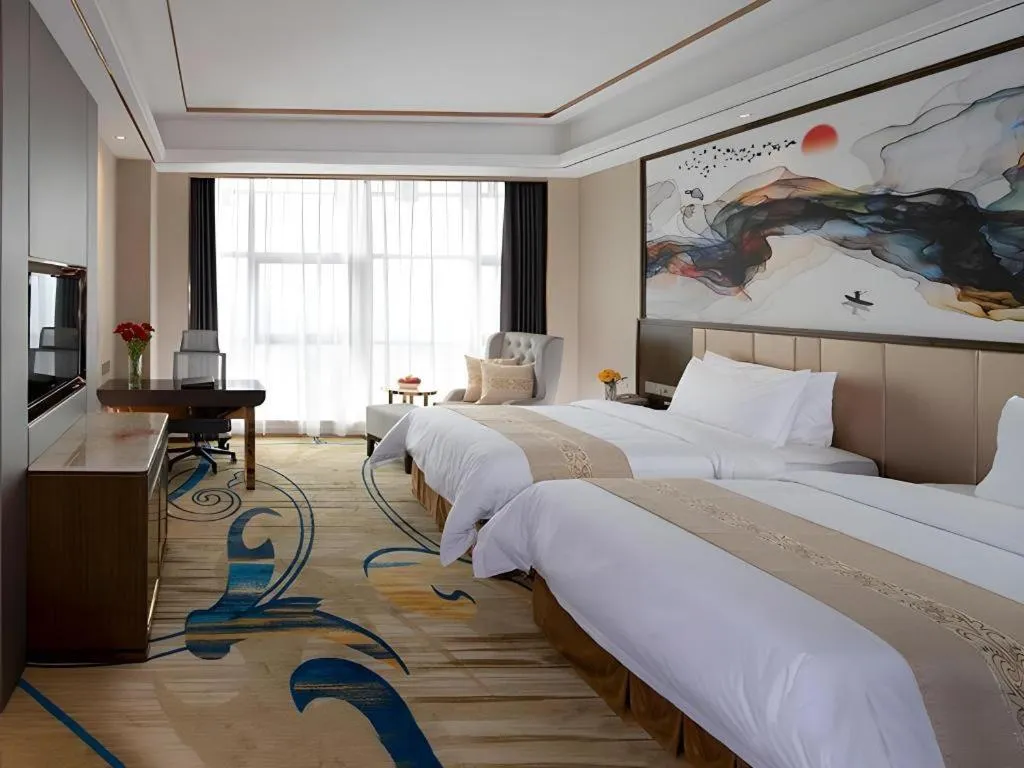 Bed in Venus Royal Hotel Nanning East High-Speed Railway Station