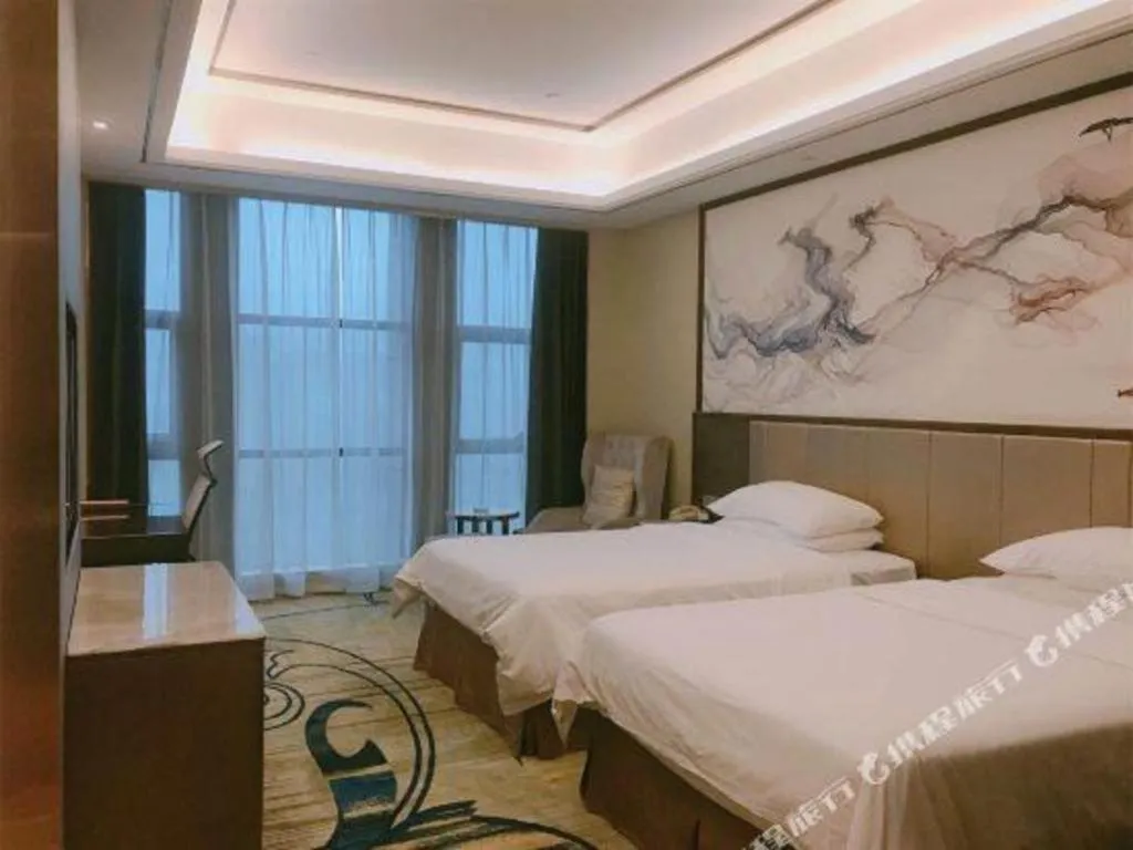 Bed in Venus Royal Hotel Nanning East High-Speed Railway Station