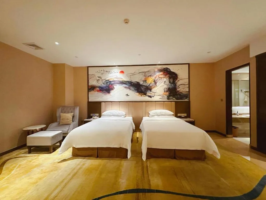 Bed in Venus Royal Hotel Nanning East High-Speed Railway Station