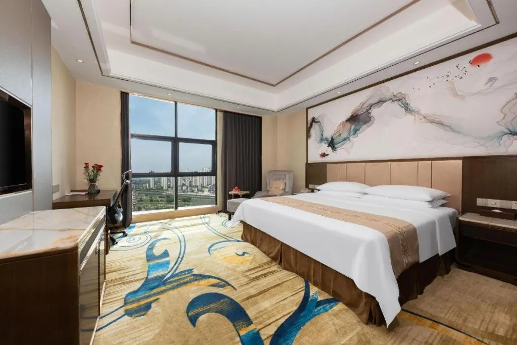 Bed in Venus Royal Hotel Nanning East High-Speed Railway Station