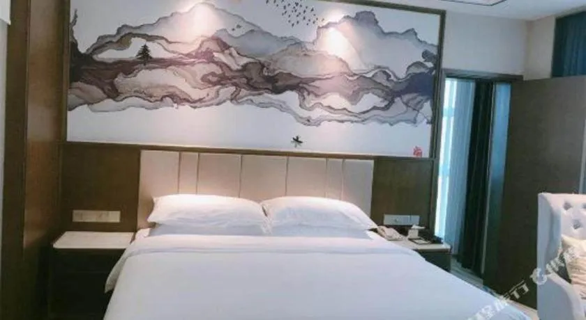 Bed in Venus Royal Hotel Nanning East High-Speed Railway Station