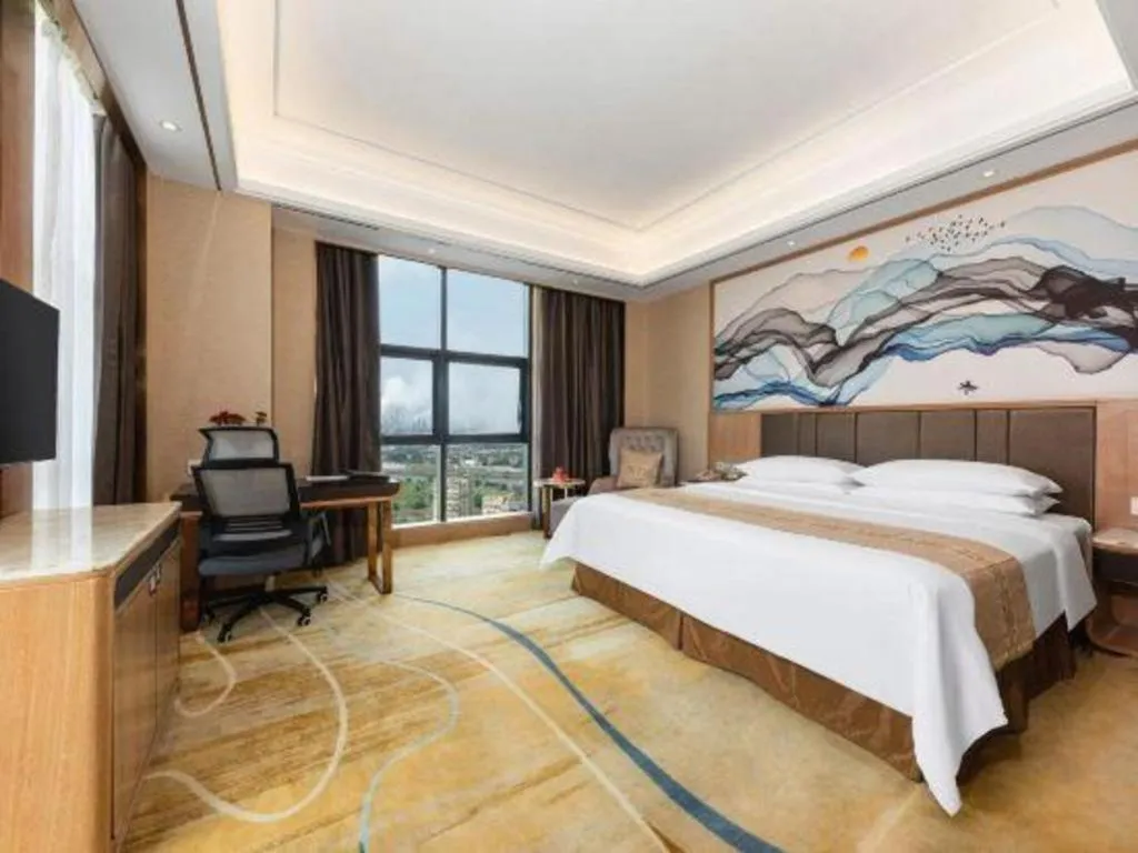Bed in Venus Royal Hotel Nanning East High-Speed Railway Station