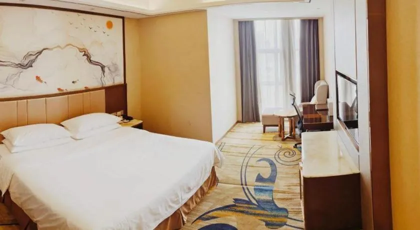 Bed in Venus Royal Hotel Nanning East High-Speed Railway Station