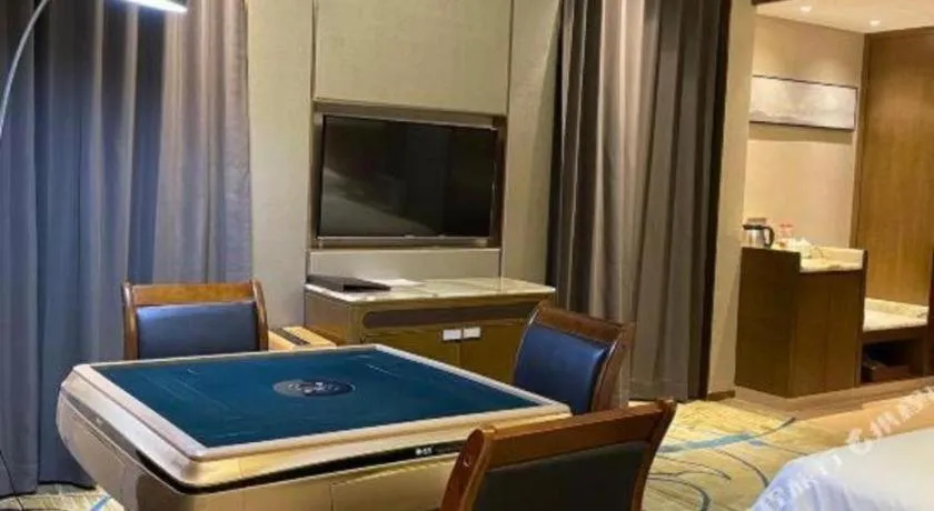 Bed in Venus Royal Hotel Nanning East High-Speed Railway Station