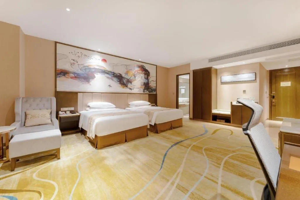 Bed in Venus Royal Hotel Nanning East High-Speed Railway Station