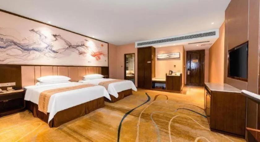 Bed in Venus Royal Hotel Nanning East High-Speed Railway Station