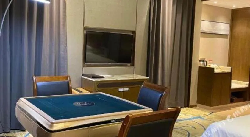 Bed in Venus Royal Hotel Nanning East High-Speed Railway Station