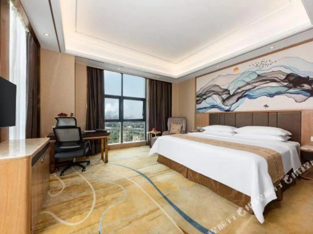 Bed in Venus Royal Hotel Nanning East High-Speed Railway Station