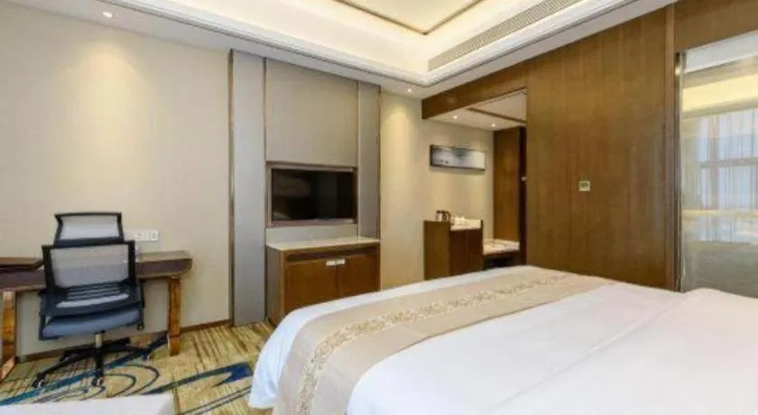 Bed in Venus Royal Hotel Nanning East High-Speed Railway Station