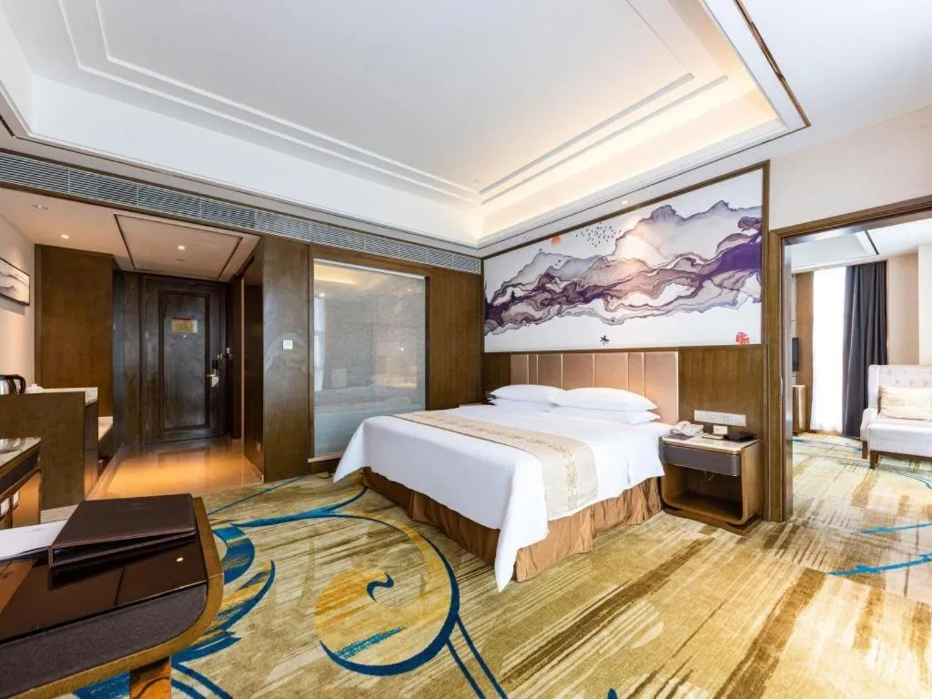Bed in Venus Royal Hotel Nanning East High-Speed Railway Station