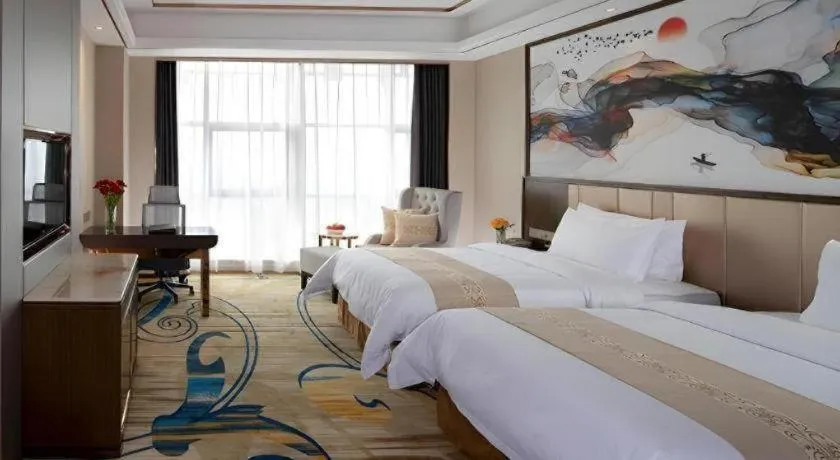 Bed in Venus Royal Hotel Nanning East High-Speed Railway Station