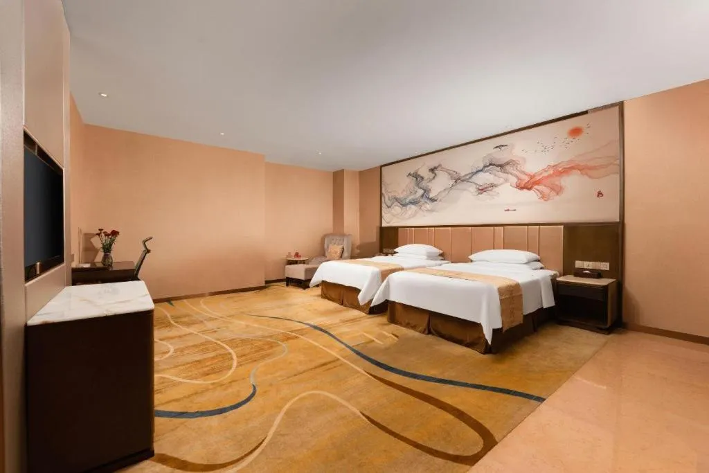 Bed in Venus Royal Hotel Nanning East High-Speed Railway Station