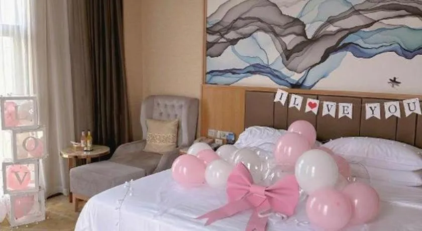 Bed in Venus Royal Hotel Nanning East High-Speed Railway Station