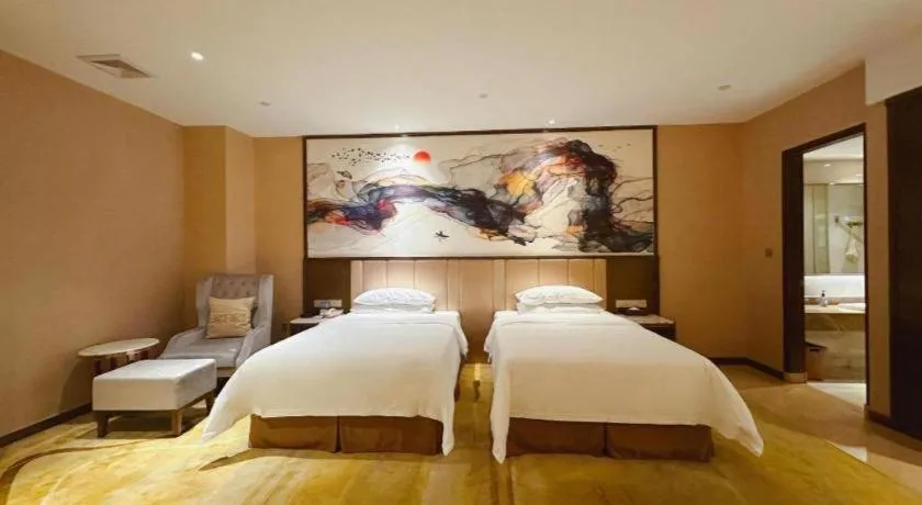 Bed in Venus Royal Hotel Nanning East High-Speed Railway Station