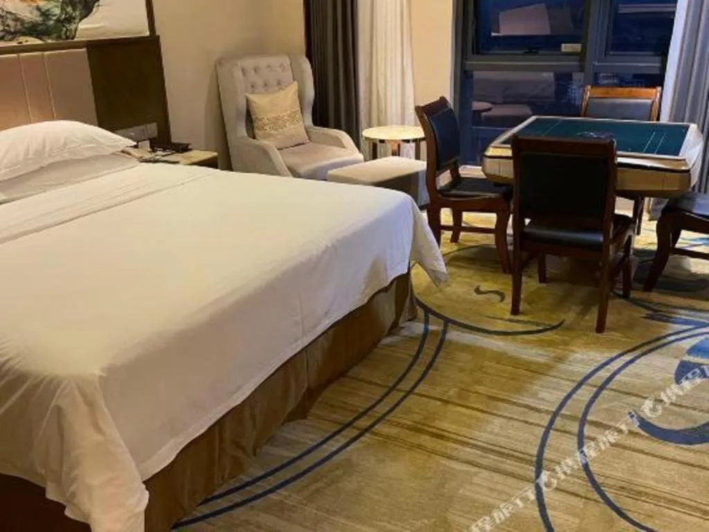 Bed in Venus Royal Hotel Nanning East High-Speed Railway Station