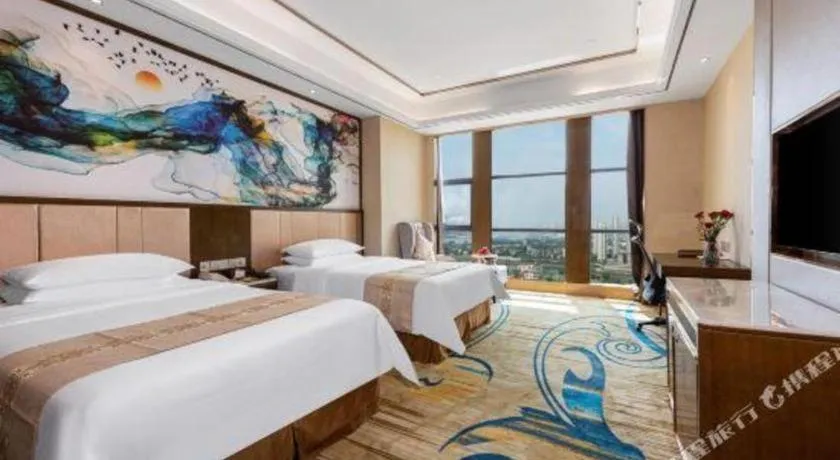 Bed in Venus Royal Hotel Nanning East High-Speed Railway Station