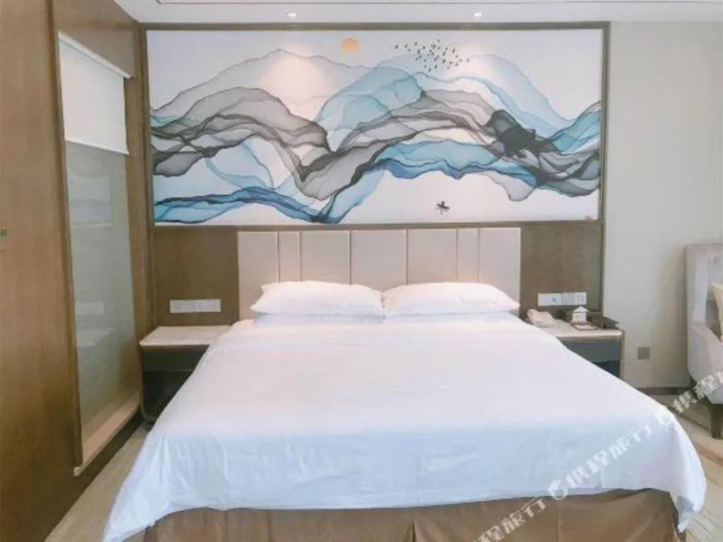 Bed in Venus Royal Hotel Nanning East High-Speed Railway Station