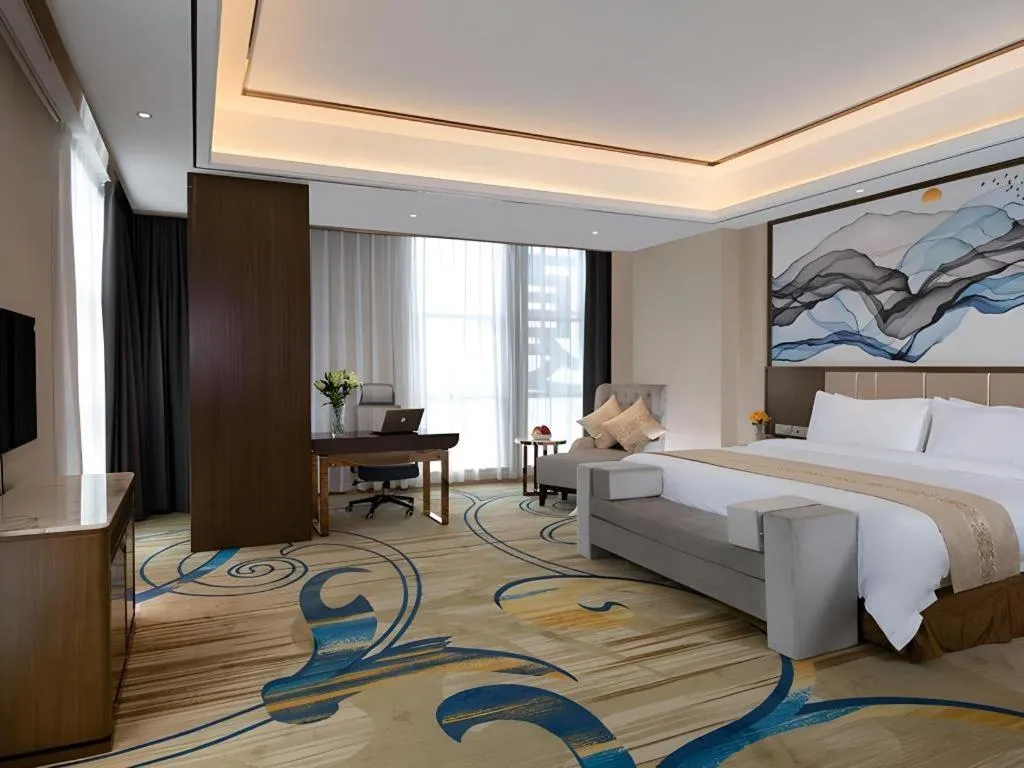 Bed in Venus Royal Hotel Nanning East High-Speed Railway Station