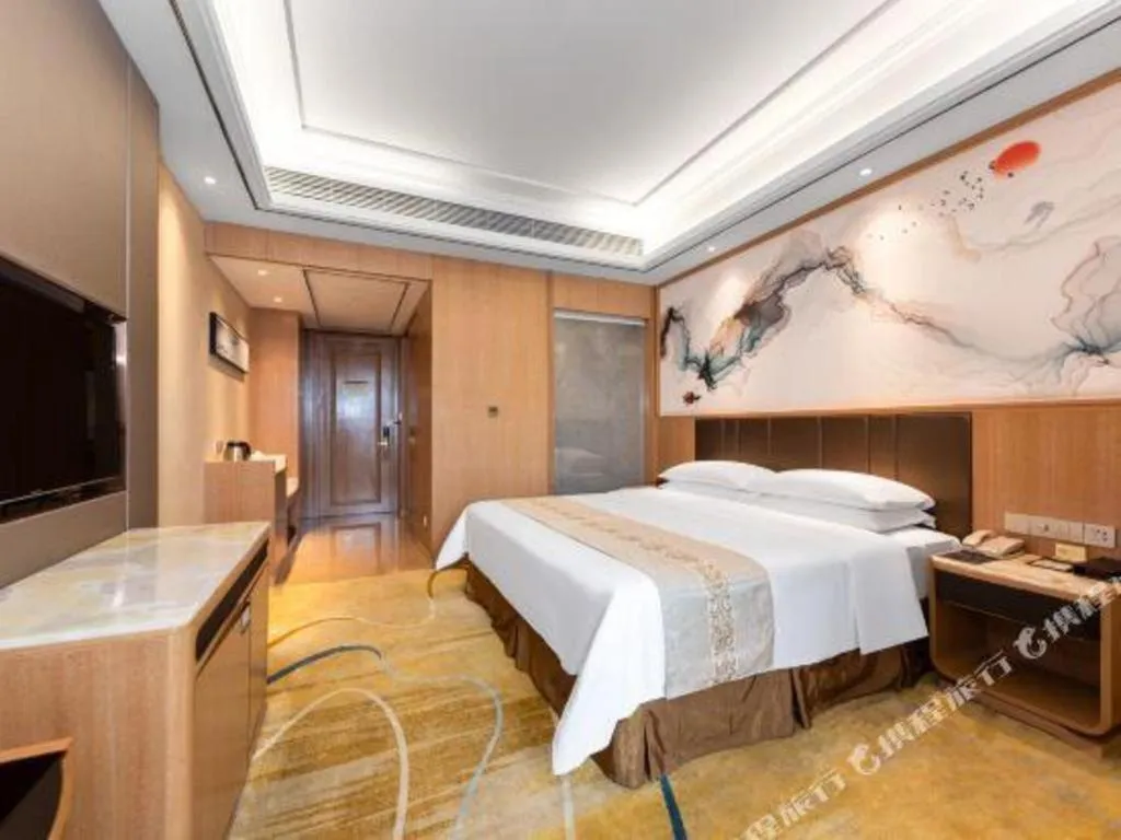 Bed in Venus Royal Hotel Nanning East High-Speed Railway Station