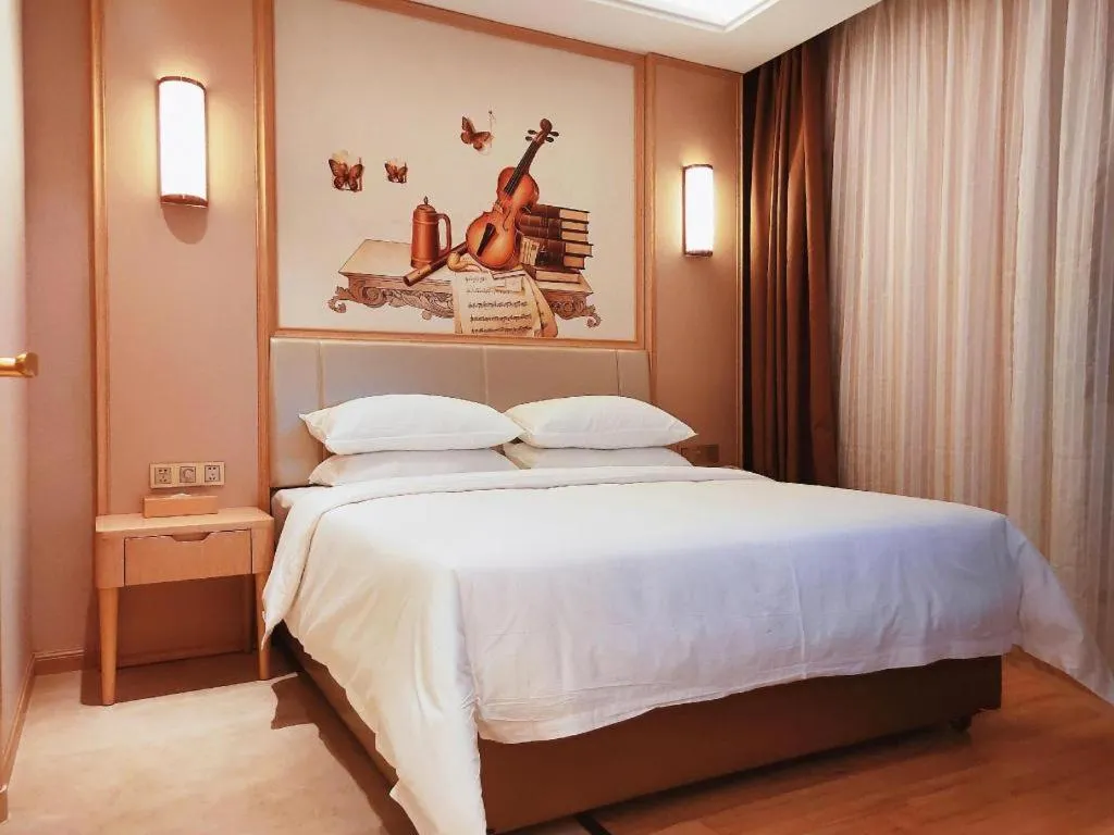 Bed in Vienna Hotel Fuzhou University Town Boshihou