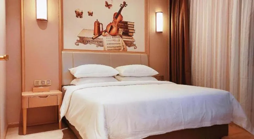 Bed in Vienna Hotel Fuzhou University Town Boshihou