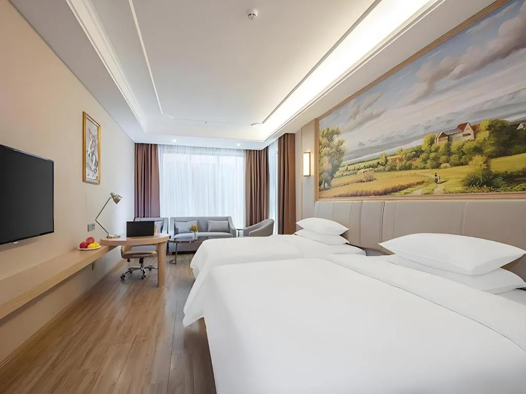 Bed in Vienna Hotel Fuzhou University Town Boshihou