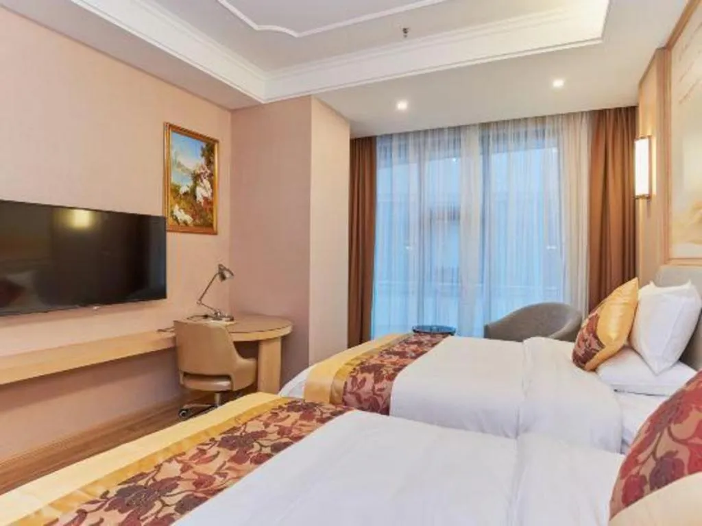 Bed in Vienna Hotel Fuzhou University Town Boshihou