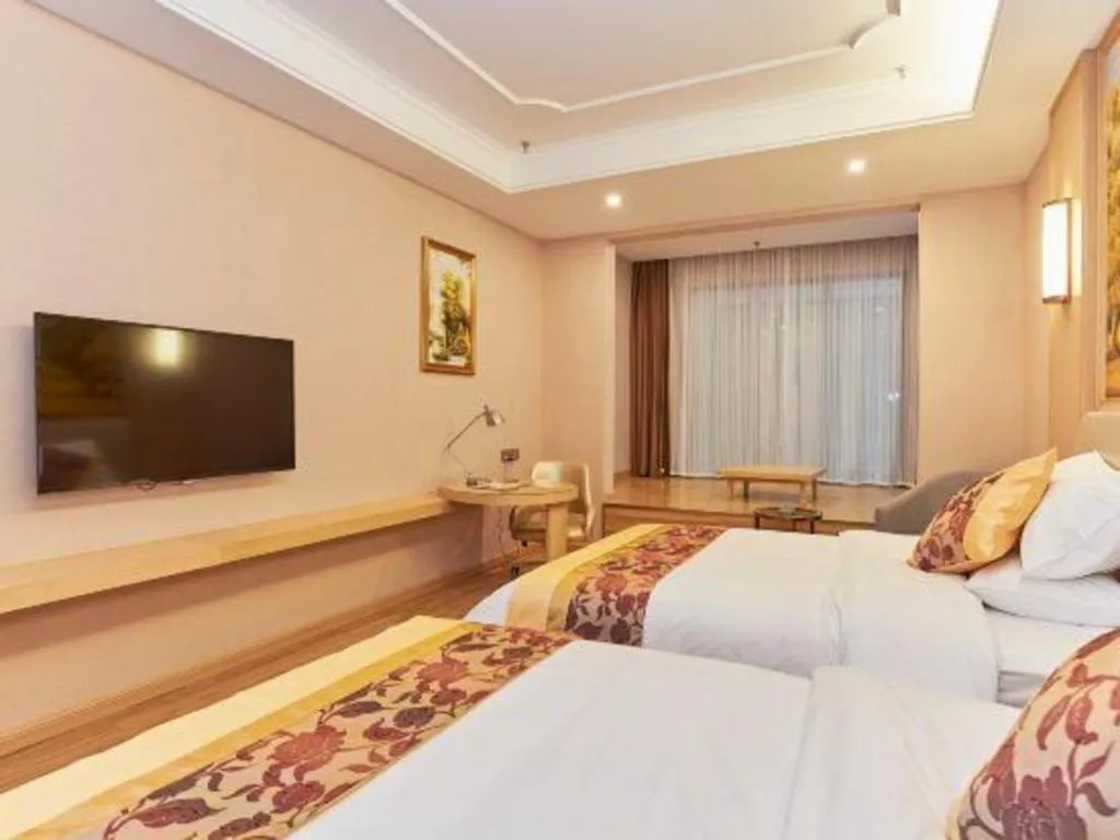 Bed in Vienna Hotel Fuzhou University Town Boshihou