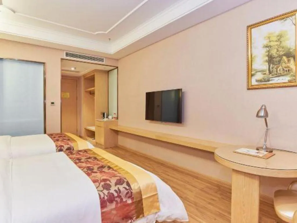 Bed in Vienna Hotel Fuzhou University Town Boshihou